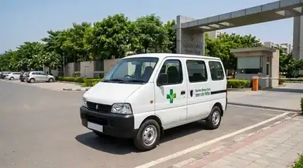 GurgaonCare white Eeco medical van ready for home visit in Gurgaon